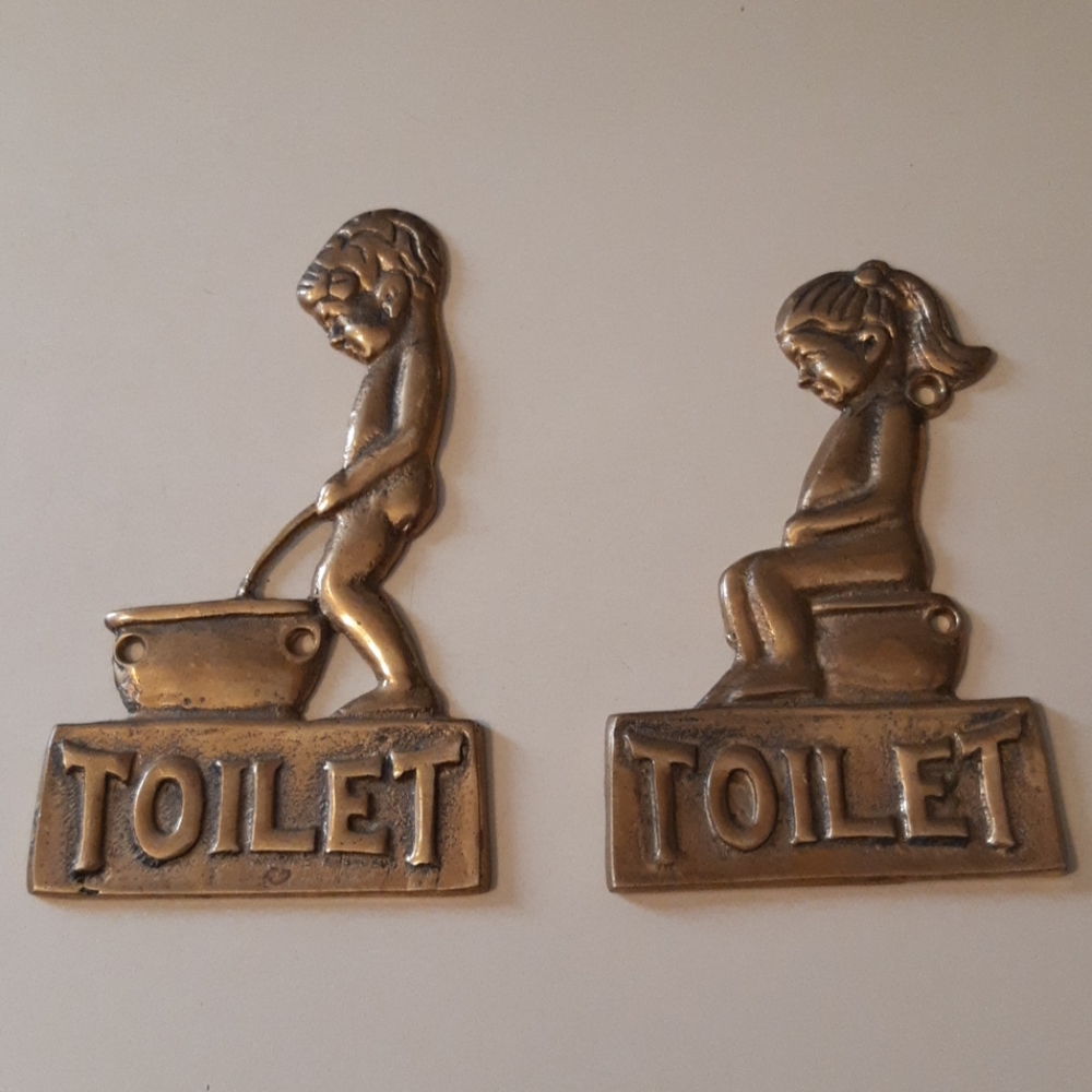 Brass toilet signs